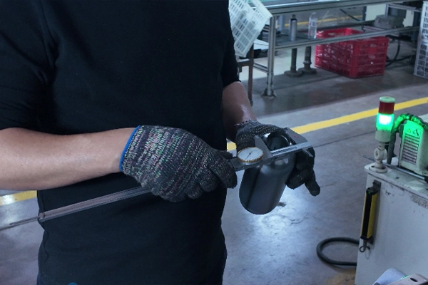 Quality control process for insulated coffee mug manufacturing