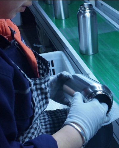 Final quality control check for custom insulated drinkware before packaging