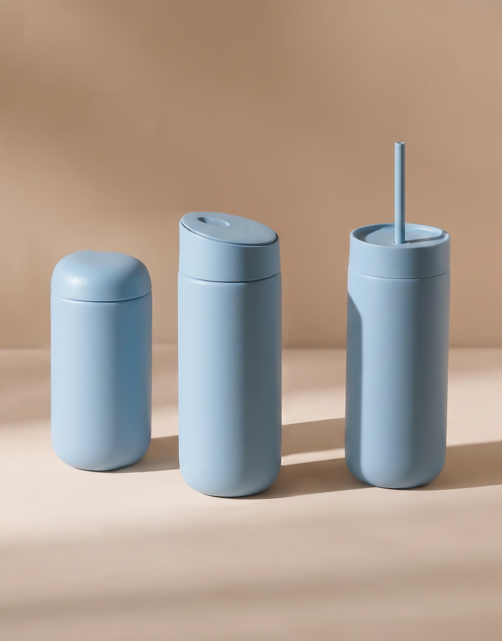 Interchangeable sip lid slide lid and straw lid options for insulated coffee mugs