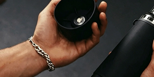 Magnetic water bottle with built in AirTag tracking compartment for location tracking via mobile phone