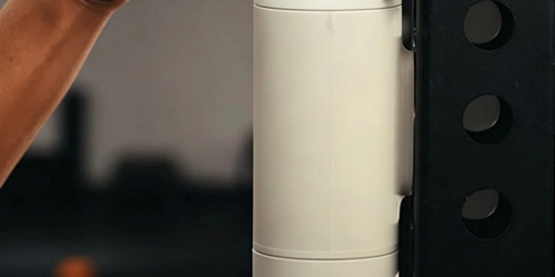 Magnetic sleeve water bottle attachment system for securing bottle to metal gym and outdoor equipment