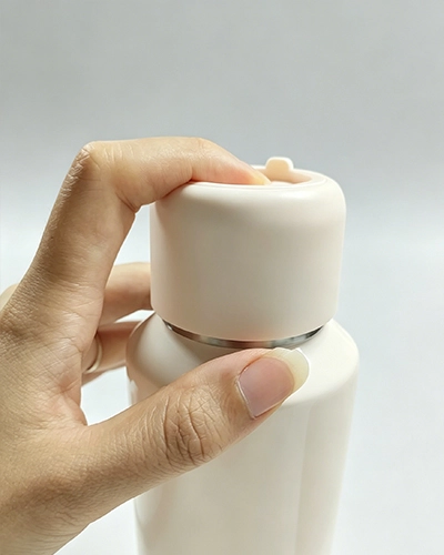 One-hand open sports water bottle with quick-access push-to-open lid