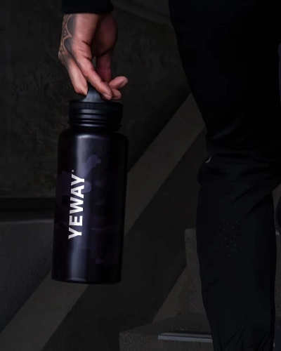 Wide mouth insulated water bottle with integrated carry handle lid