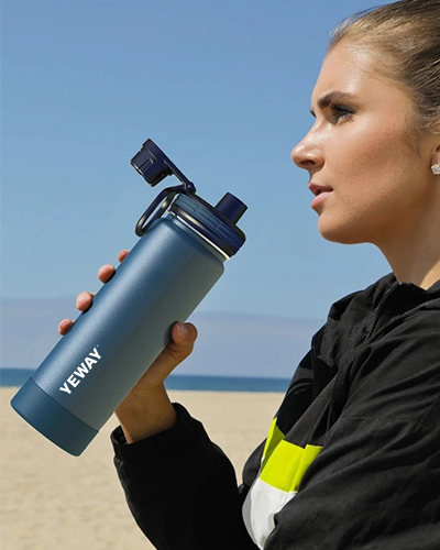 Wide mouth stainless steel water bottle with loop handle screw cap