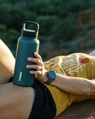 Wide mouth insulated water bottle with heavy duty handle lid for outdoor hydration