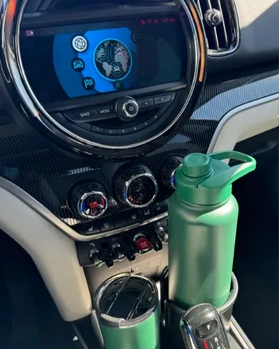 Wide mouth insulated water bottle with spout lid and carry handle