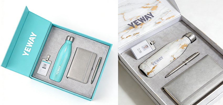 A corporate welcome kit featuring a custom-branded flask, notebook, and pen, designed for new employee engagement