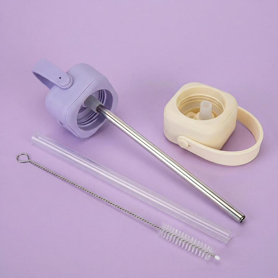 Internal view of the handle lid showing interchangeable drinking straw options: sustainable 304 stainless steel and food-grade soft silicone, with included cleaning brush - YEWAY.