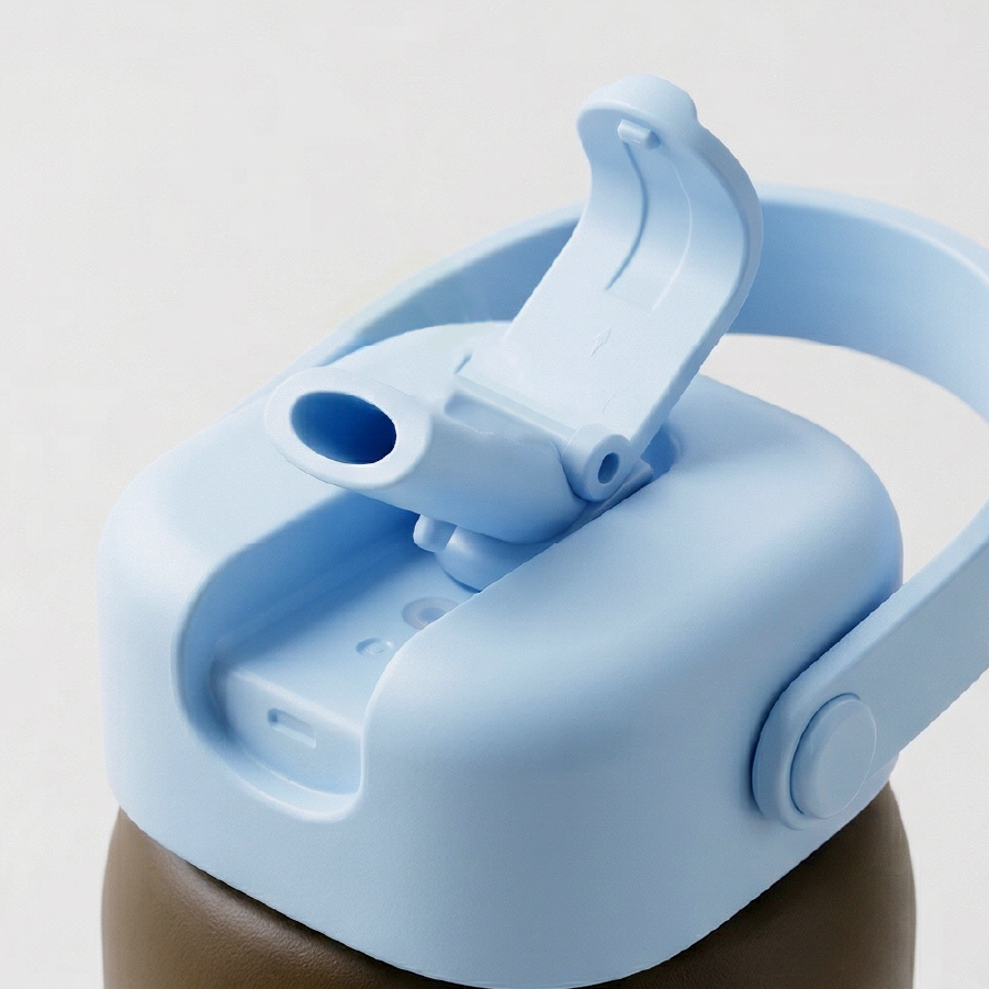 Ergonomic flip-up straw lid in open position, highlighting the smooth drinking spout and durable hinge design.